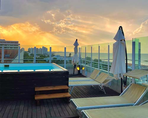 Swimming pool at sunset